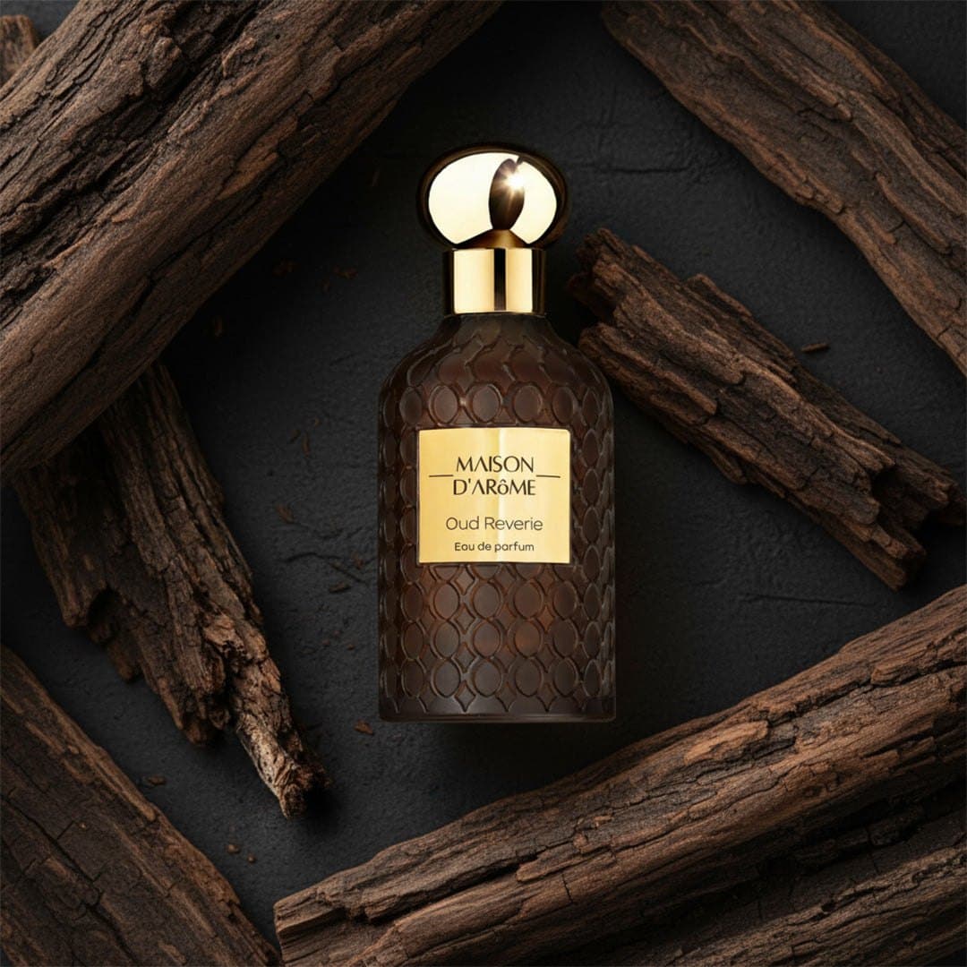 Oud Reverie among pieces of agarwood